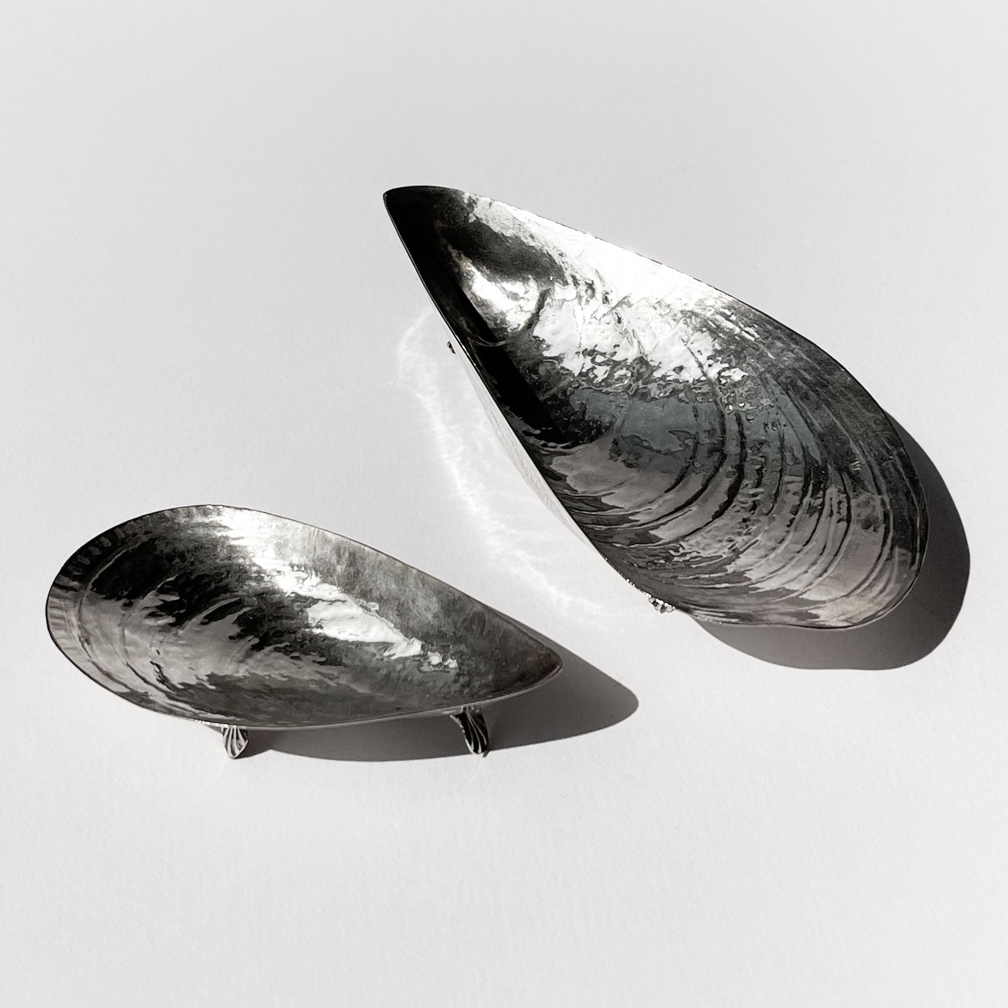 Set of 2 delicate silver mussel shell plates, 1960s.