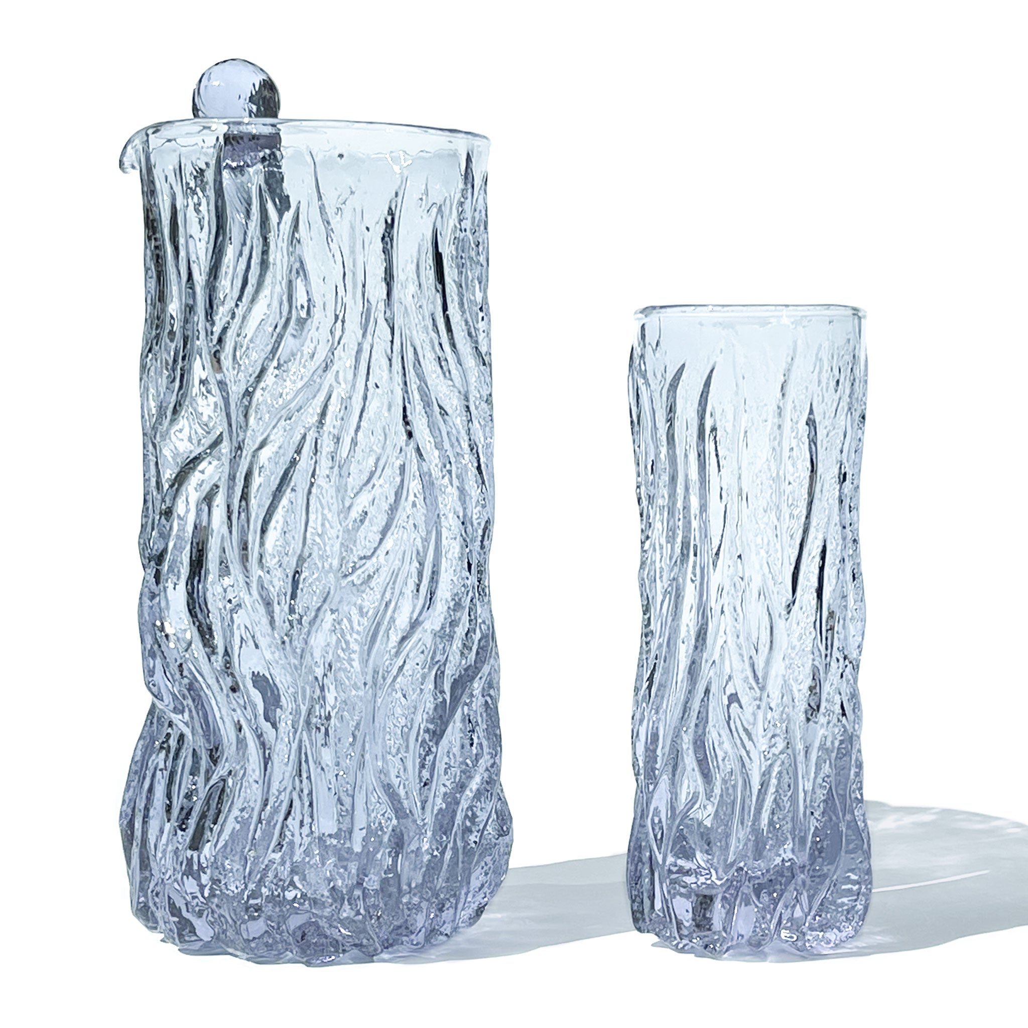 Brutalist set of 6 glasses with pitcher and stirrer in textured neodymium glass, Italy, 1970s.