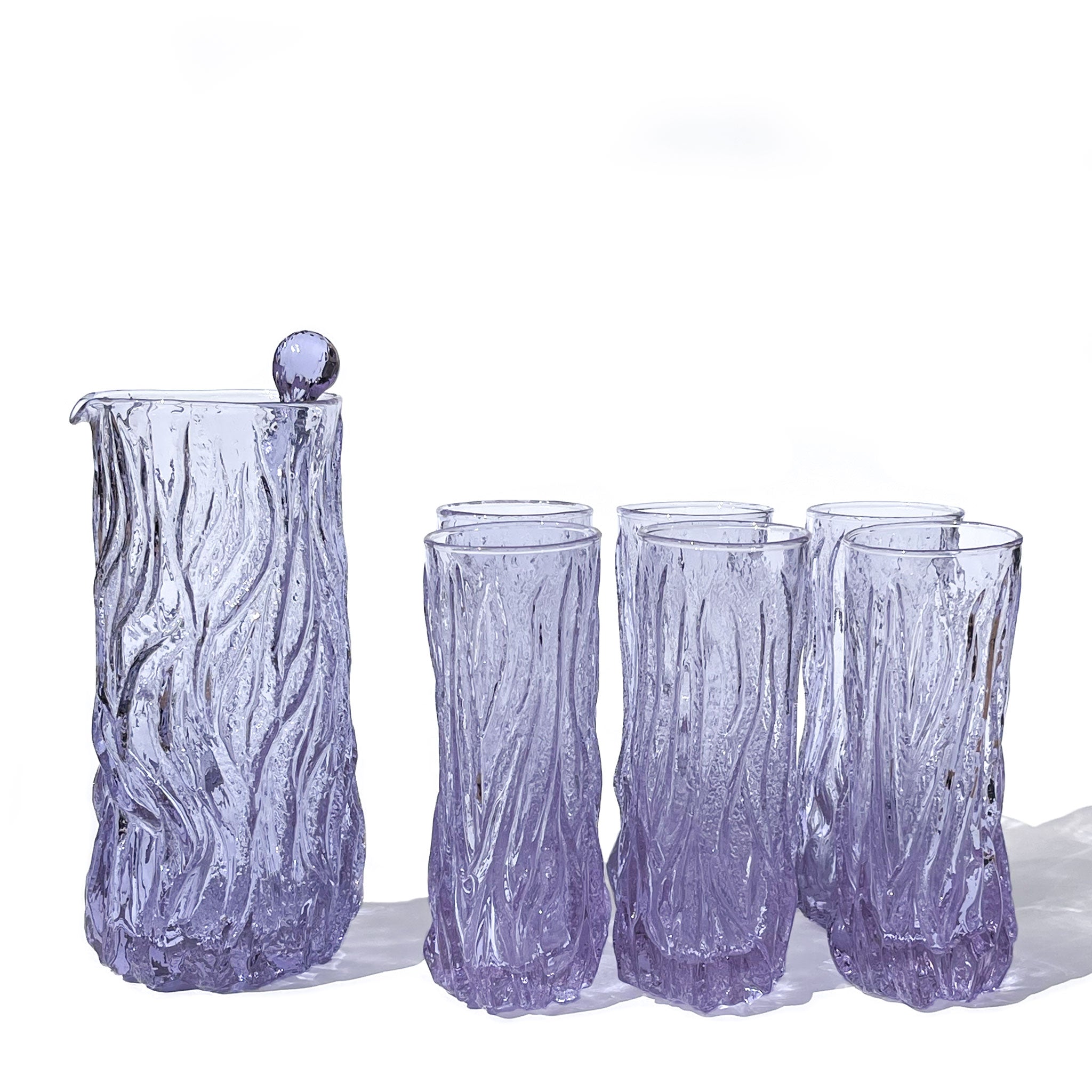 Brutalist set of 6 glasses with pitcher and stirrer in textured neodymium glass, Italy, 1970s.