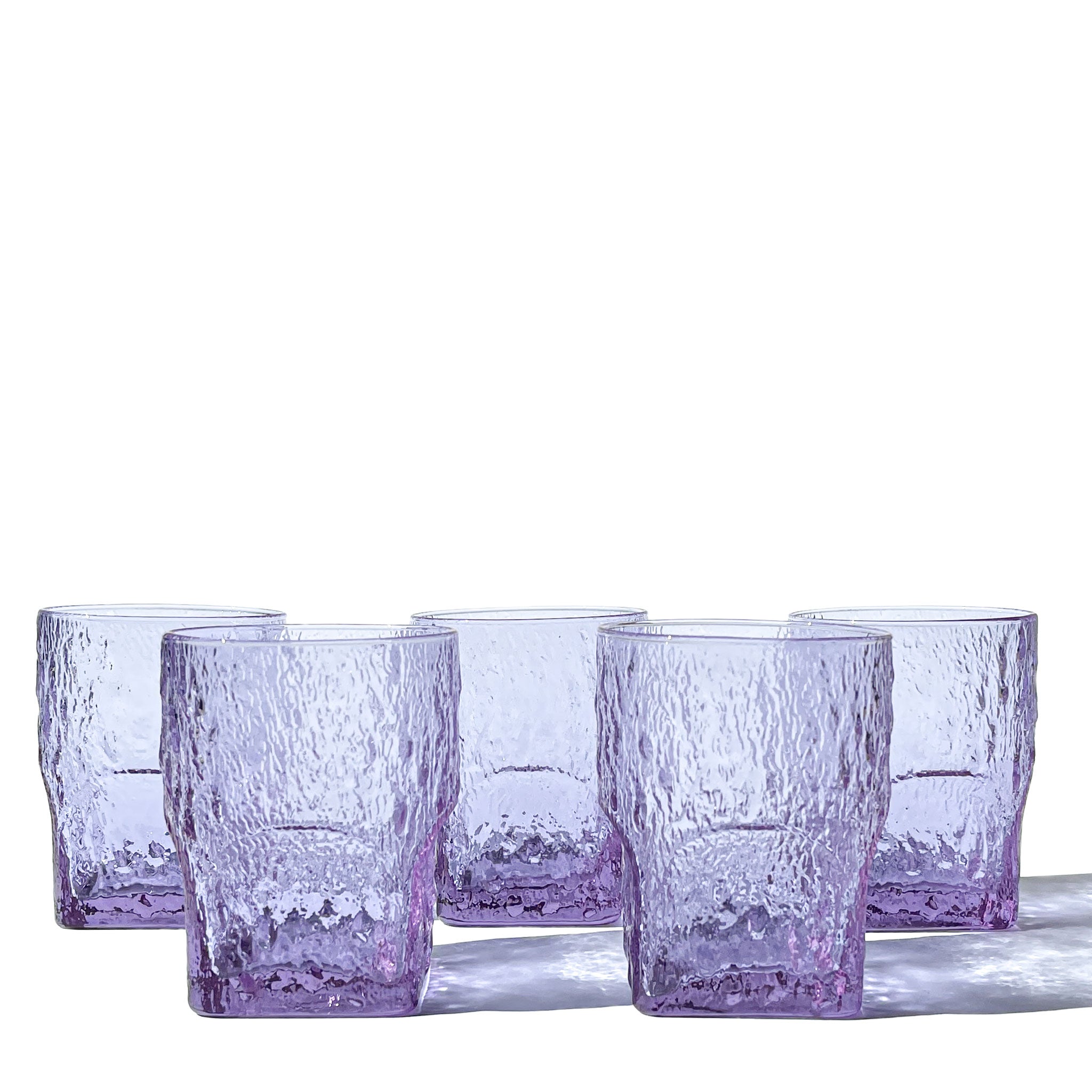 Set of 5 sculptural glasses in textured neodymium glass, Italy, 1970s