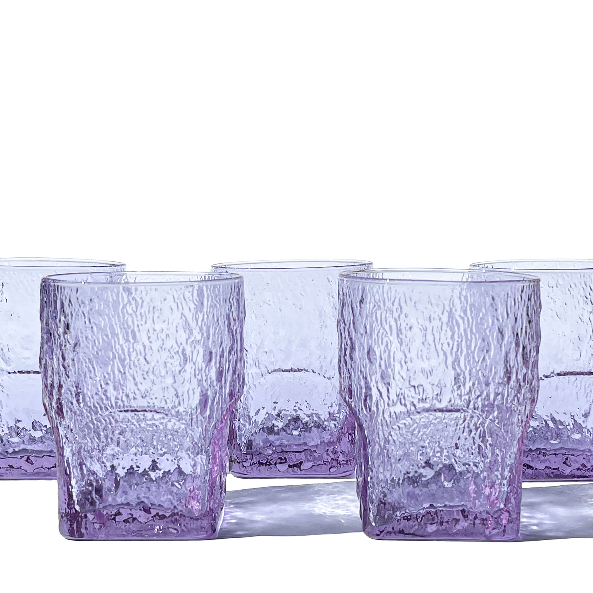 Set of 5 sculptural glasses in textured neodymium glass, Italy, 1970s