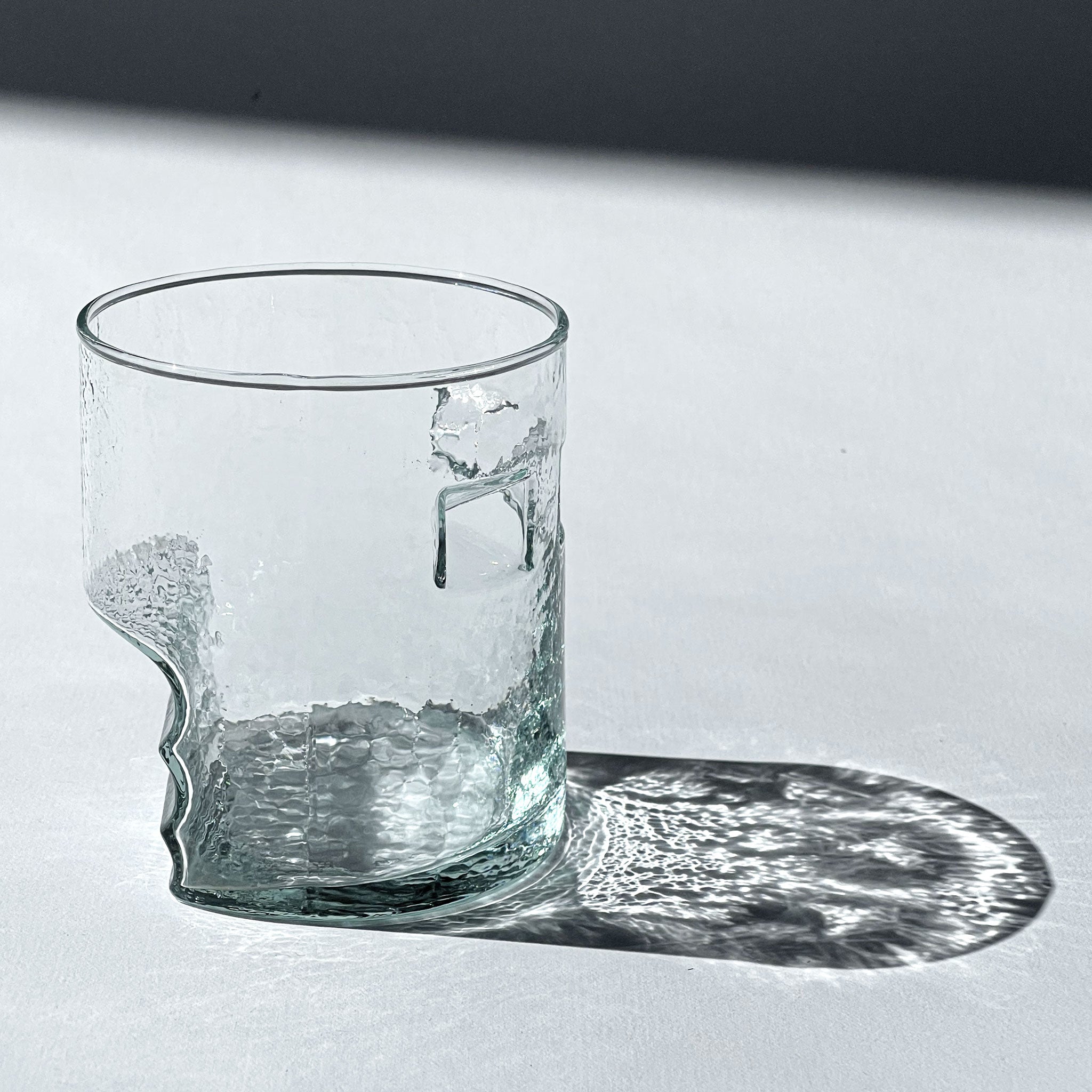 Set of 4 playful postmodern glasses with tactile indentations, 1980s.