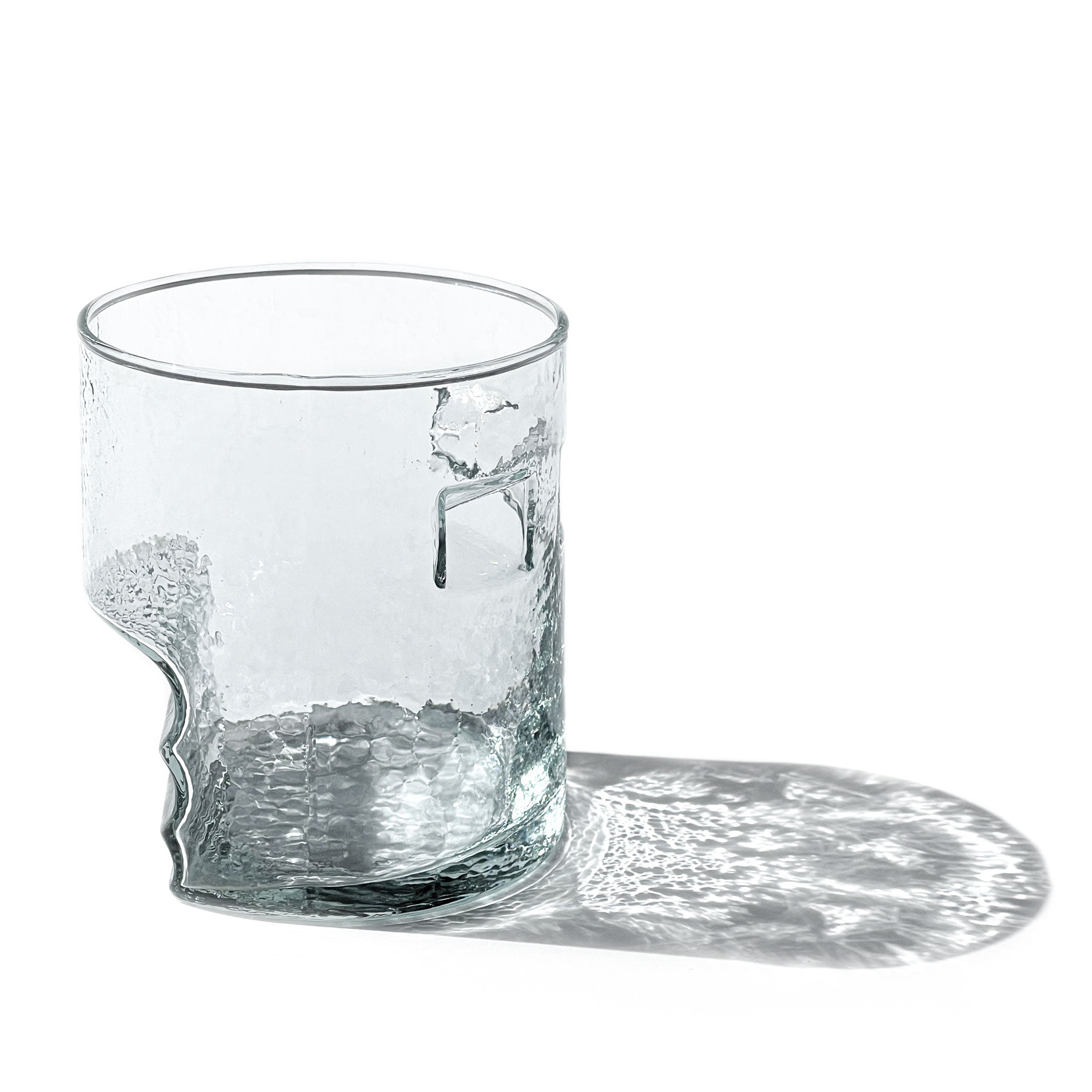 Set of 4 playful postmodern glasses with tactile indentations, 1980s.