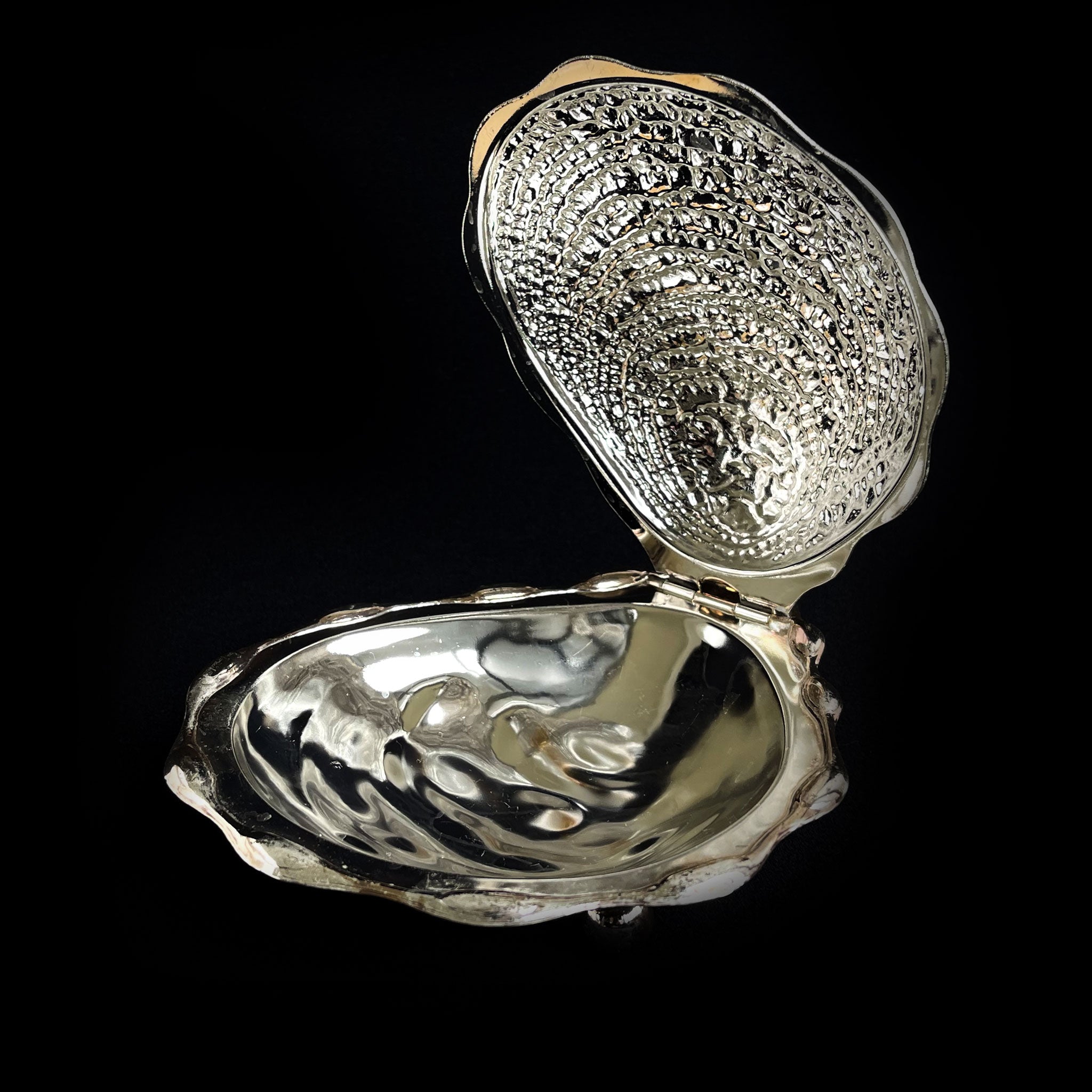 Sculptural shell box with richly textured lid, 1960s.