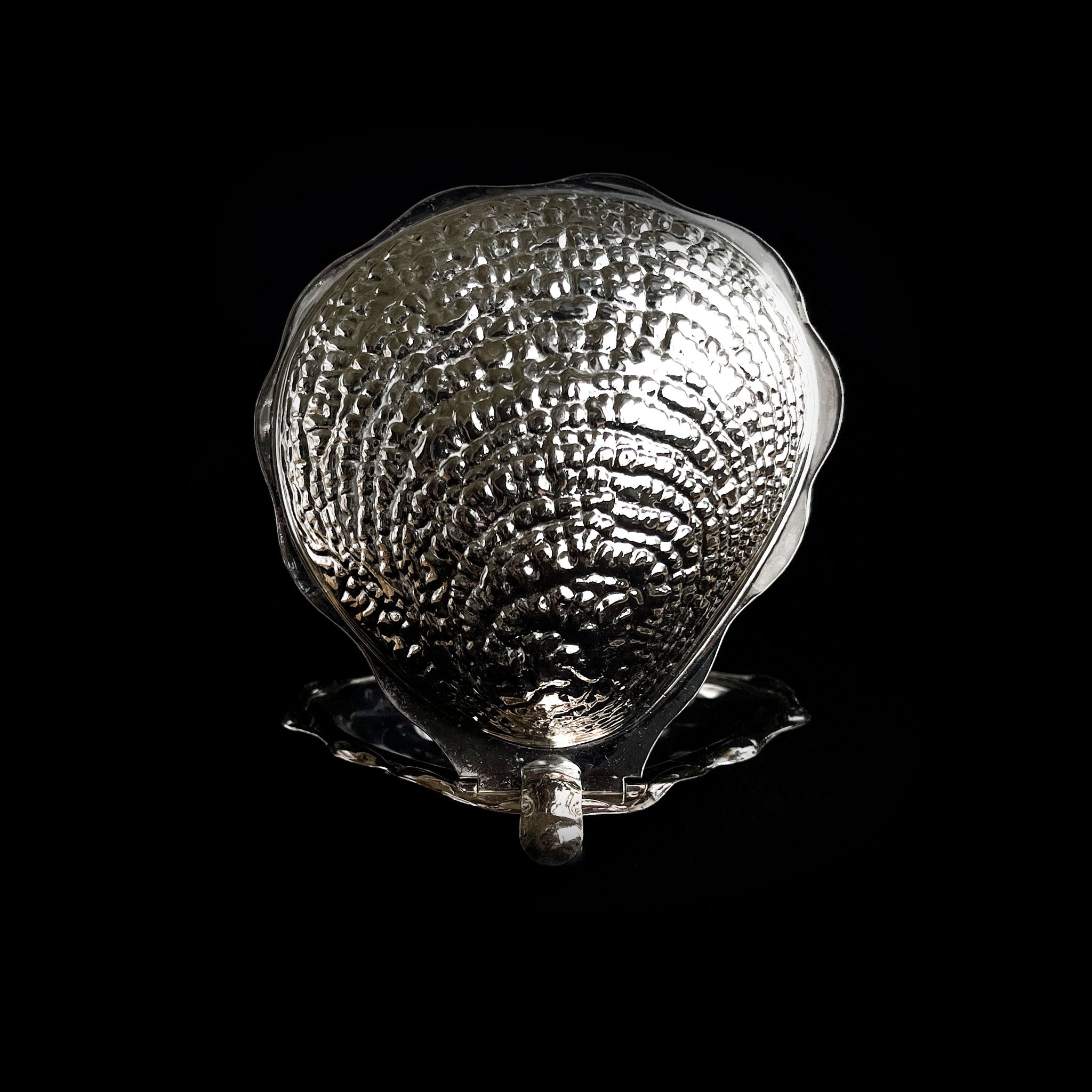 Sculptural shell box with richly textured lid, 1960s.