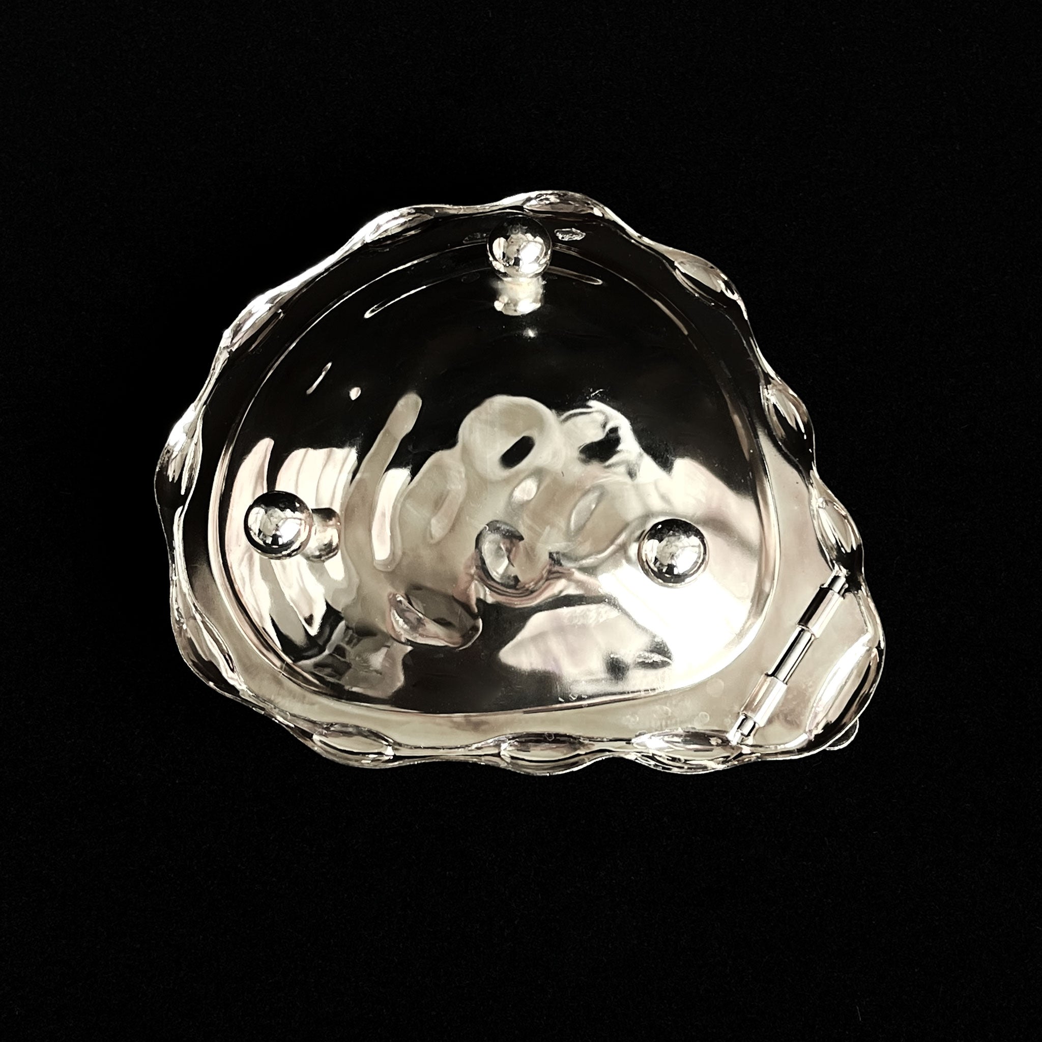 Sculptural shell box with richly textured lid, 1960s.