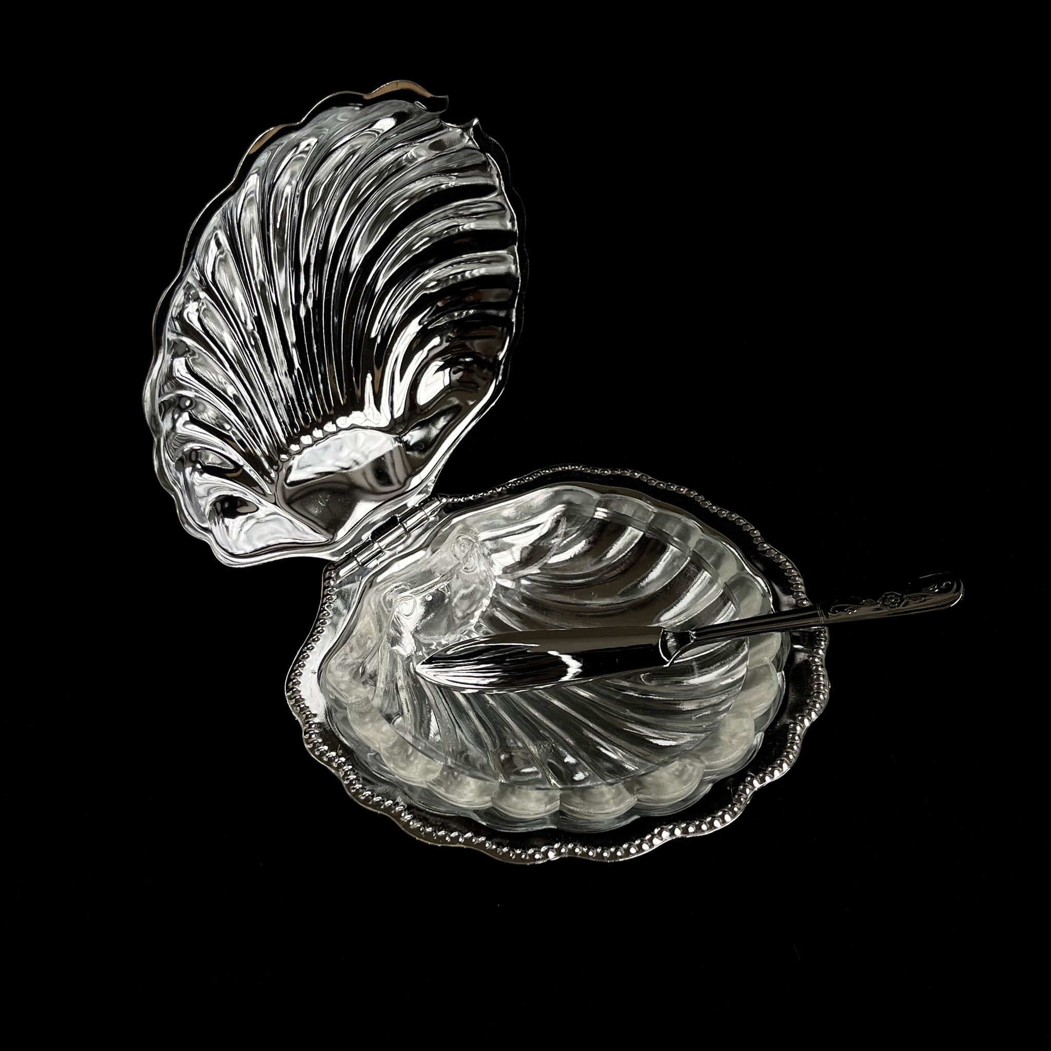 Sea shell-shaped dish with knife, England, 1970s.