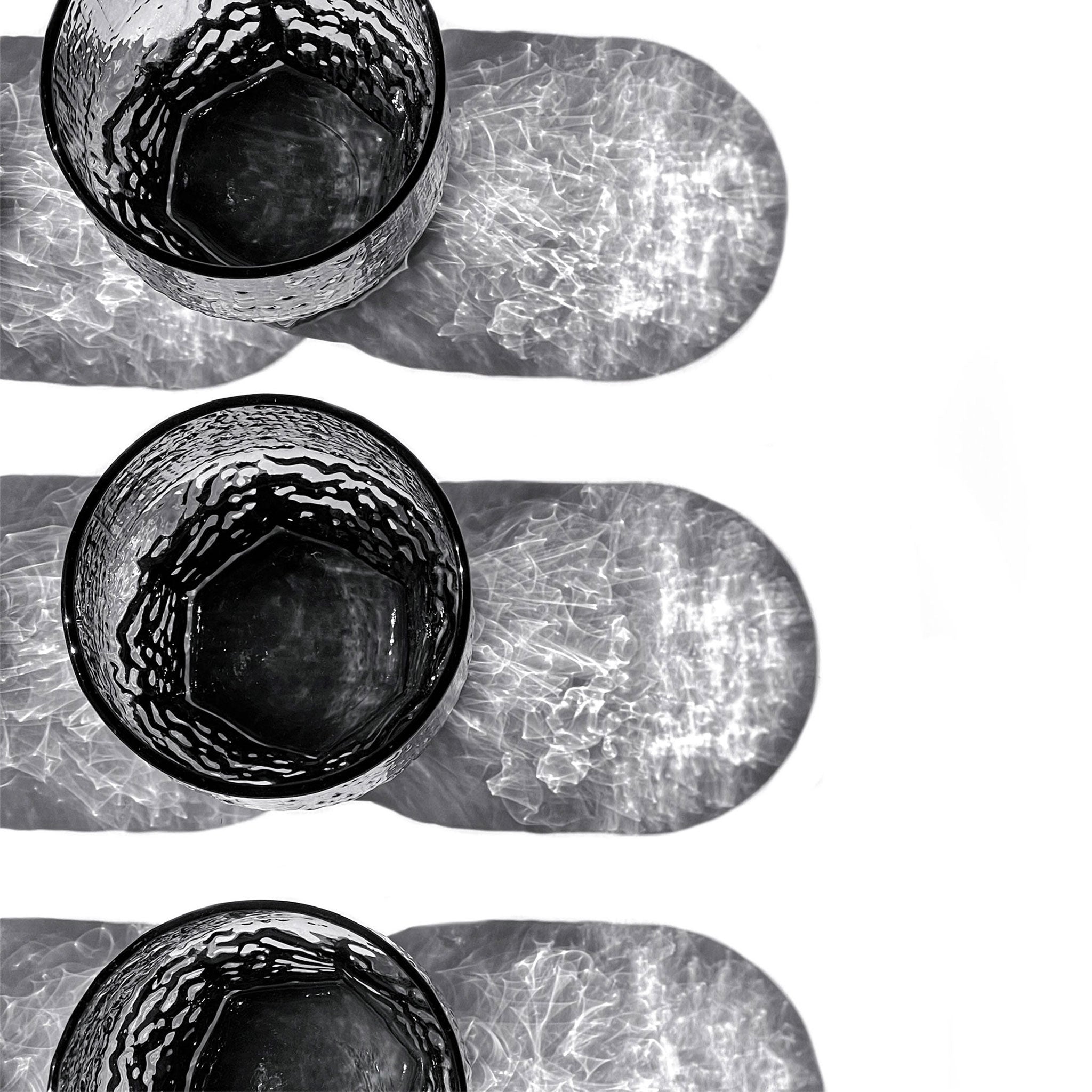 Set of 9 Aslak textured grey glasses by Tapio Wirkkala for Iittala, Finland, 1970s.