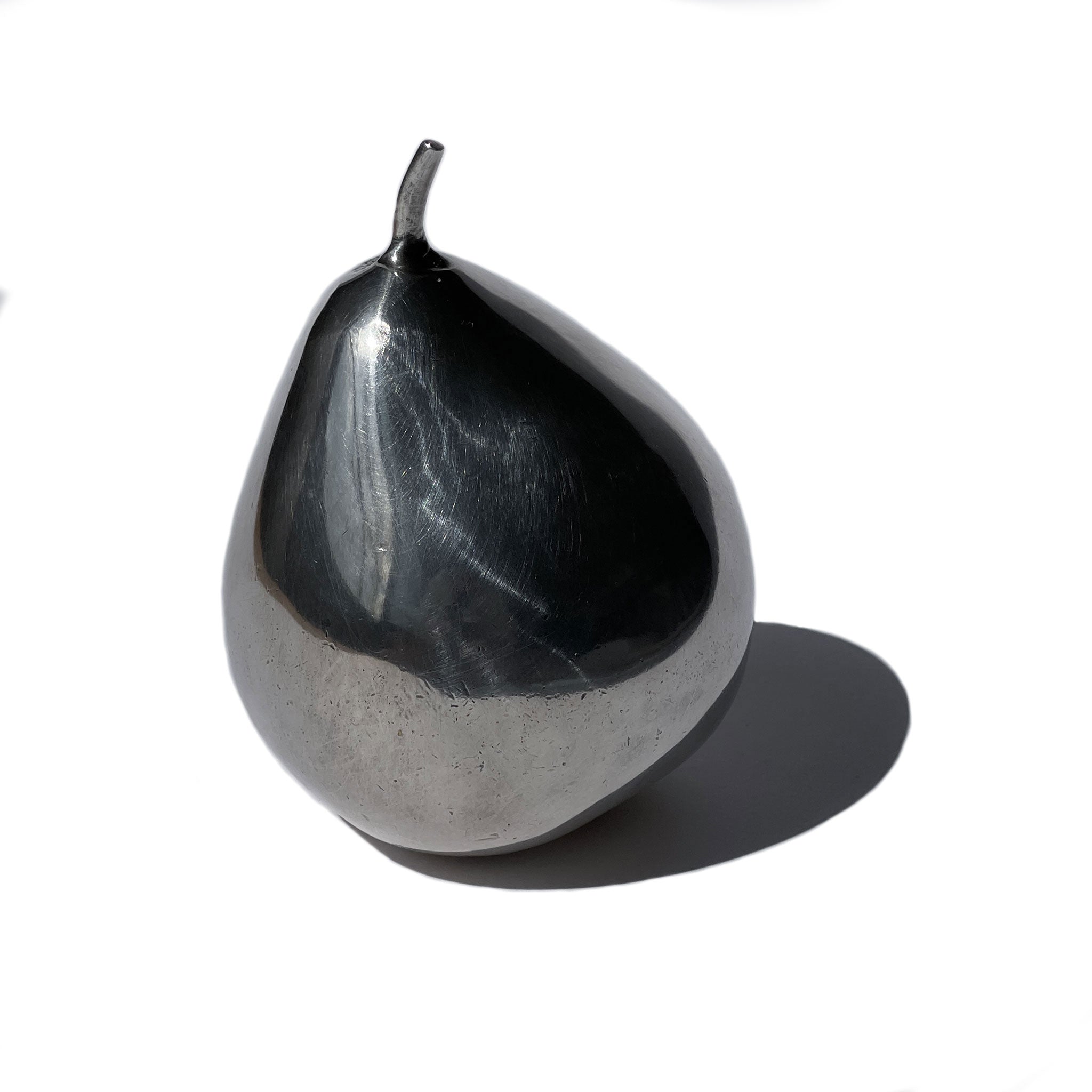 Silver pear — life-size sculpture. Garden Futures.