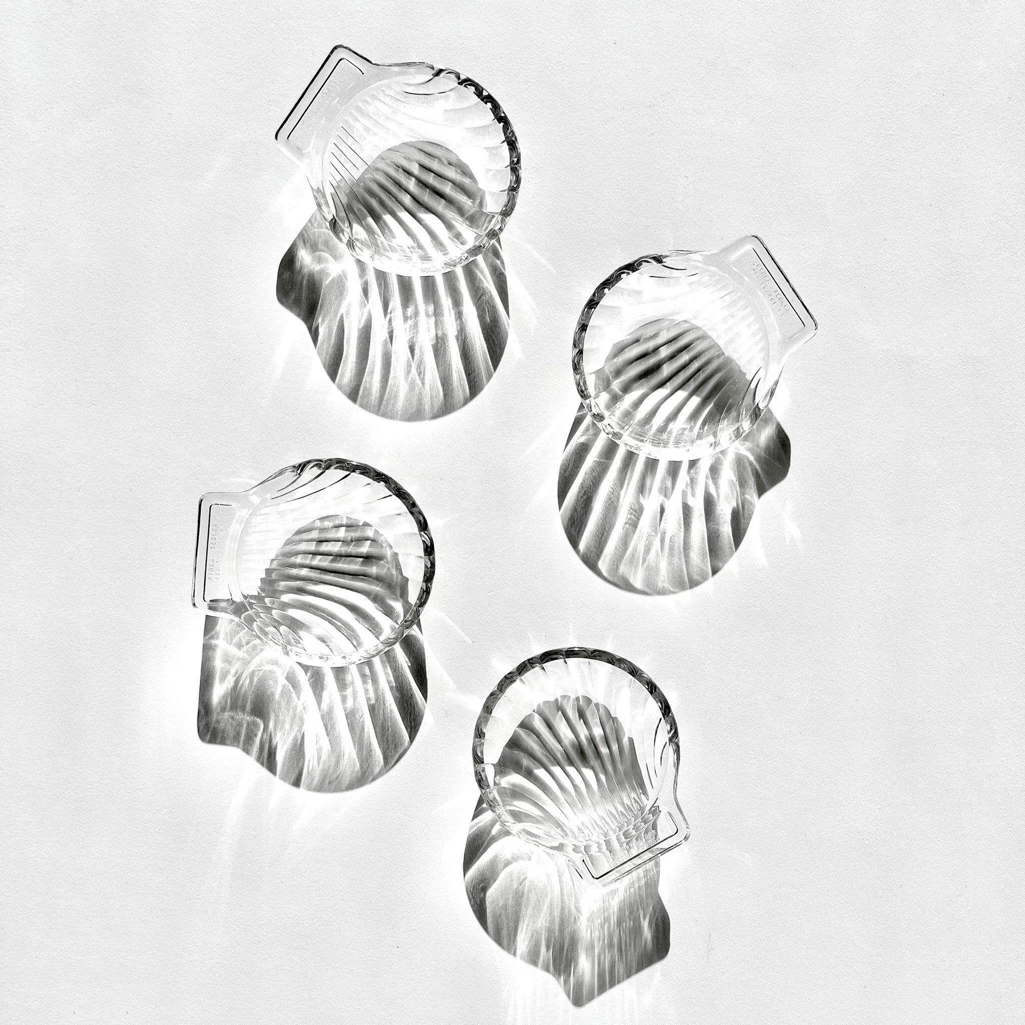 Shell-shaped glass plates.